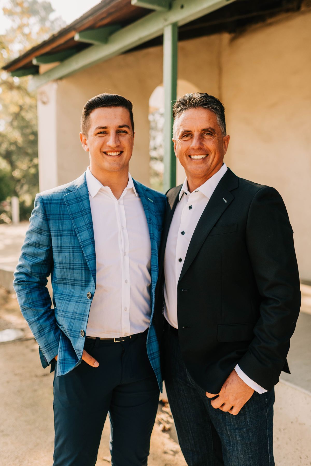 Drew Lehr and his father outside the office